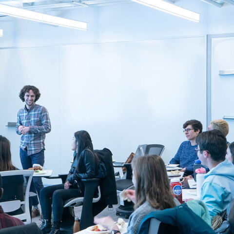 The 2020 Kessler Fellows present to their classmates in a classroom.