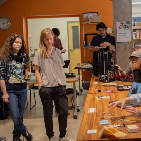 program participants listen to presenters inside of Rev: Ithaca Startup Works